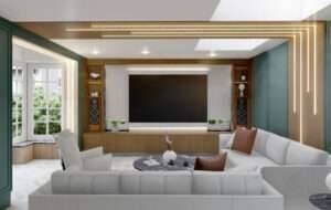 Modern home cinema room design with large media screen, architectural linear lighting, green wall panels, and white sectional sofa by Oraanj Interiors London. Modern home cinema room design with large media screen, architectural linear lighting, green wall panels, and white sectional sofa by Oraanj Interiors London.