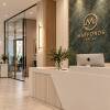 Luxury corporate reception interior and bespoke desk in Hayes by Oraanj